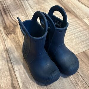Navy blue croc rain boots